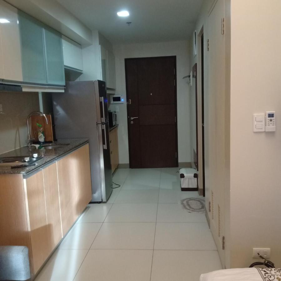 One Uptown Opposite Of Grandhyatt Hotel Manila Taguig City Экстерьер фото